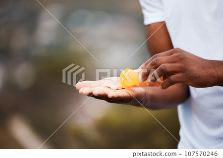 Pills, space and medicine with hands of person in nature for healthcare, pharmacy and supplements. Vitamins, medical and wellness with closeup of man and medication for antibiotics and mockup Pills, space and medicine with hands of person in nature for healthcare, pharmacy and supplements. Vitamins, medical and wellness with closeup of man and medication for antibiotics and mockup 107570246