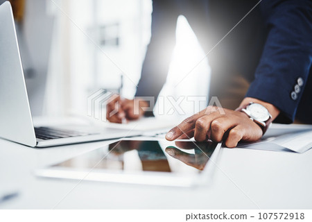 Professional, man and laptop for research on tablet at work for analysis about career at desk. Businessman, hand and email for online at a workplace with a digital screen for communication on web. Professional, man and laptop for research on tablet at work for analysis about career at desk. Businessman, hand and email for online at a workplace with a digital screen for communication on web. 107572918