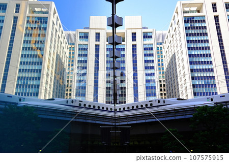 Shinkansen reflected in the show window 107575915