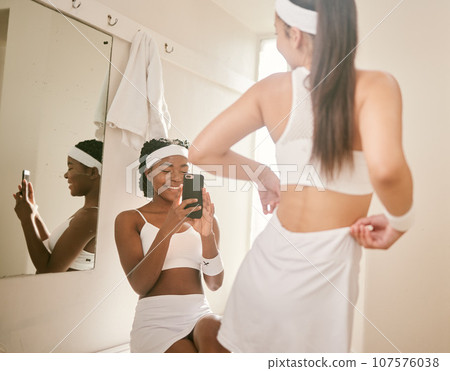 Tennis, picture and friends in change room of sports club with photo for social media wellness and fitness post. Phone, training and influencer women live streaming online together at exercise 107576038