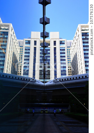 Shinkansen reflected in the show window Shinkansen reflected in the show window 107576130