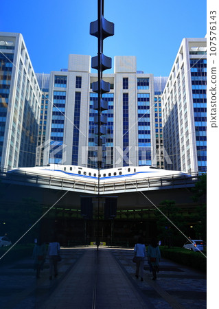 Shinkansen reflected in the show window Shinkansen reflected in the show window 107576143