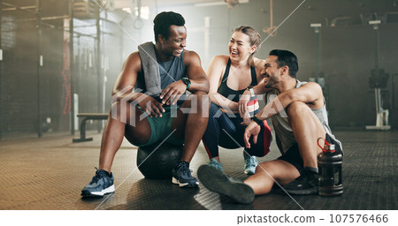 Fitness, group and conversation in gym with confidence, workout and exercise class. Diversity, friends talk and wellness portrait of athlete with coach ready for training and sport at a health club Fitness, group and conversation in gym with confidence, workout and exercise class. Diversity, friends talk and wellness portrait of athlete with coach ready for training and sport at a health club 107576466