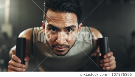 Man at gym, weight sled and muscle building endurance, strong body and balance power in fitness. Commitment, motivation and bodybuilder in workout challenge for health and wellness on push machine. 107576596