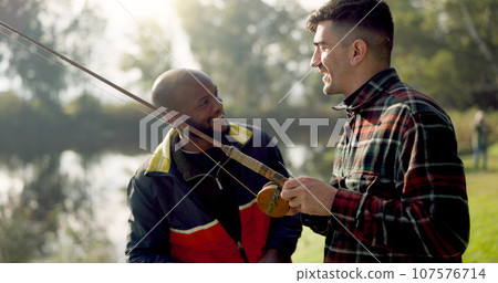 Fishing, lake and friends in nature talking on holiday, adventure and vacation together outdoors. Friendship, conversation and men with rods by river for sports hobby, activity and catching fish 107576714