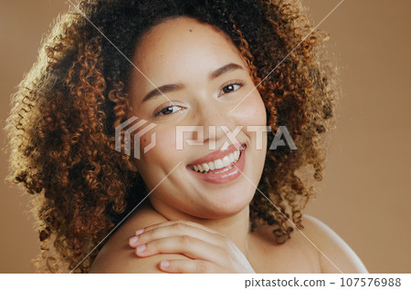 Happy woman, portrait and face in skincare cosmetics or natural beauty against a studio background. Closeup of female person or model smile for dermatology, soft skin or spa treatment and grooming 107576988
