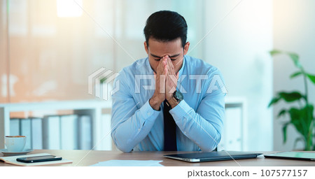 Stressed Sales manager is angry about a bad sales report after a marketing campaign. Frustrated executive is upset and annoyed about advertising problem and is under real pressure to hit his deadline 107577157