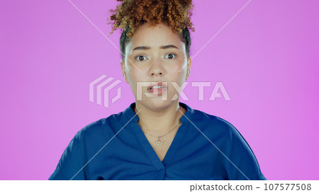 Shocked, surprise and portrait of woman with fear, worried and scared isolated in a studio purple background. Confused, omg and young person in Brazil amazed by announcement, gossip or secret Shocked, surprise and portrait of woman with fear, worried and scared isolated in a studio purple background. Confused, omg and young person in Brazil amazed by announcement, gossip or secret 107577508