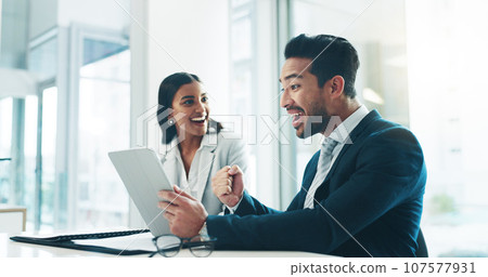 Tablet, wow and good news with business people in an office as a winner team for a career growth opportunity. Technology, success or promotion with a man and woman employee in celebration of a bonus 107577931