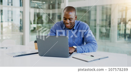 Business man, laptop and happy in office for finance, budget report and revenue proposal, taxes review or bookkeeping. Professional african worker on computer for online accounting, audit or planning 107578289