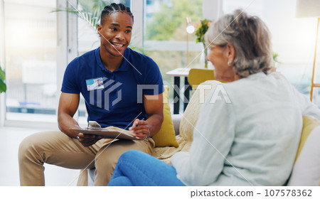 Retirement, paperwork and a nurse talking to an old woman patient about healthcare in an assisted living facility. Medical, planning and communication with a black man consulting a senior in her home 107578362