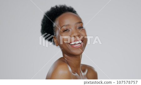 Face, skincare and beauty of funny black woman in studio isolated on a gray background mockup space. Portrait, natural cosmetics and African model laugh in spa facial treatment, wellness and health Face, skincare and beauty of funny black woman in studio isolated on a gray background mockup space. Portrait, natural cosmetics and African model laugh in spa facial treatment, wellness and health 107578757