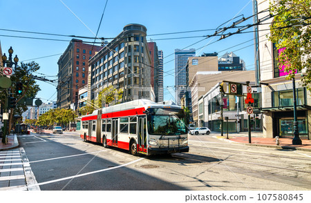Electric trolleybus on Market Street in Downtown San Francisco - California, United States 107580845