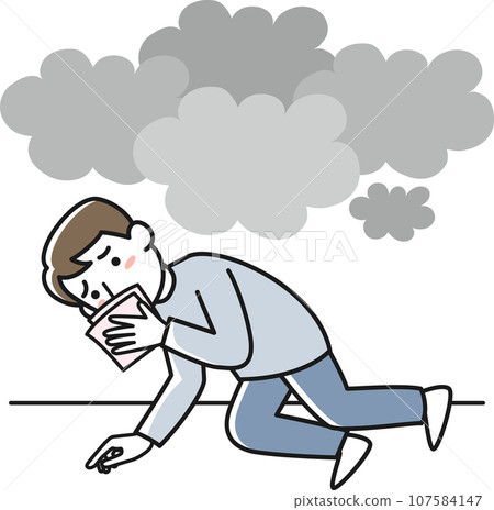 一名年輕男子在火災中摀住口鼻並低位撤離。 107584147