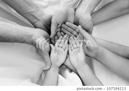 Hands. Human hand together closeup 107584213