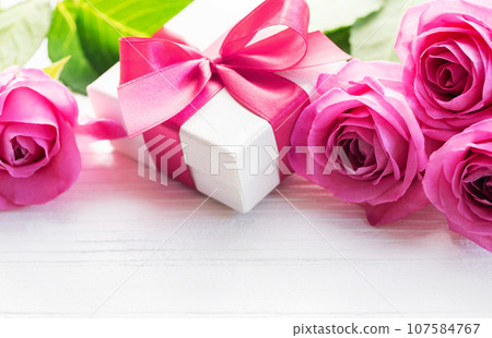 Bouquet of roses and gift box Bouquet of roses and gift box 107584767