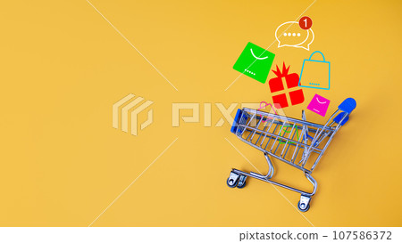 Shopping cart on white background with light and shadow. schopping concept. Shopping cart on white background with light and shadow. schopping concept. 107586372