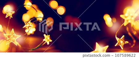 Art Merry Christmas and Happy New Year Greeting card or Banner background, Christmas tree Light Stars decoration. 107589622