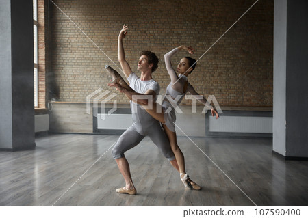 Graceful classic ballet duet, contemporary choreography dancers Graceful classic ballet duet, contemporary choreography dancers 107590400