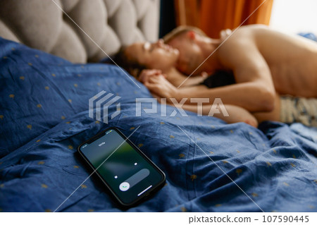 Man cheating on his wife having sex with mistress while phone calling Man cheating on his wife having sex with mistress while phone calling 107590445