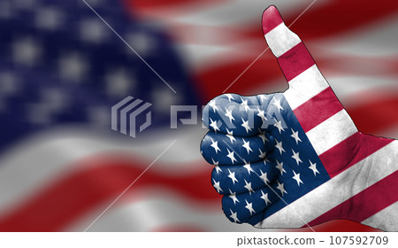 thumbs up in approval with the USA American flag painted 107592709