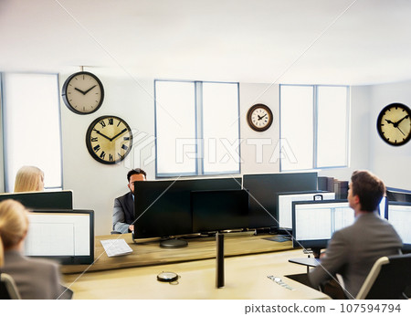 Businessmen pressed for time 107594794