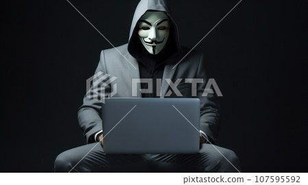 portrait hacker wearing suit holding the laptop on grey isolated background portrait hacker wearing suit holding the laptop on grey isolated background 107595592