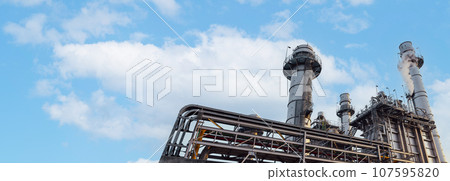 Fuel Power plant modern power industry production building with blue sky background for clean eco energy wide banner Fuel Power plant modern power industry production building with blue sky background for clean eco energy wide banner 107595820