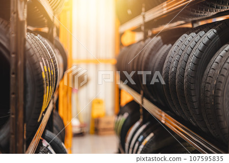 new car tire mix type on storage shelf at warehoue stock inventory in auto garage workshop for sale new car tire mix type on storage shelf at warehoue stock inventory in auto garage workshop for sale 107595835