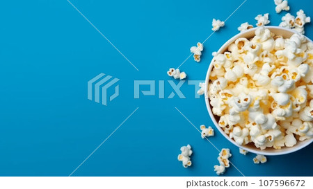 Popcorn on a blue background. 107596672