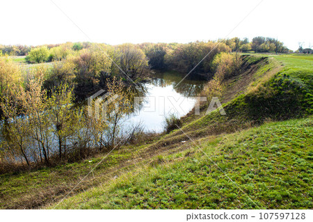 River in the village. The road leading to the river. 107597128