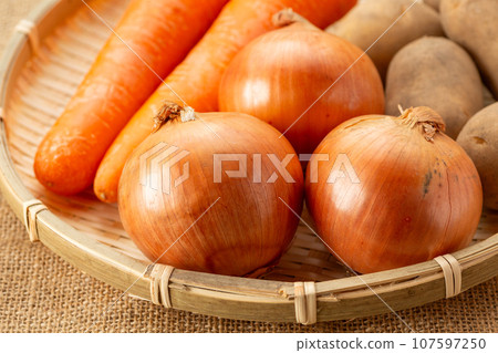 onions, potatoes, carrots onions, potatoes, carrots 107597250