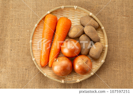 onions, potatoes, carrots onions, potatoes, carrots 107597251