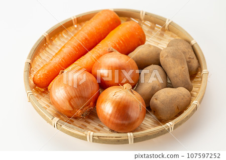 onions, potatoes, carrots onions, potatoes, carrots 107597252