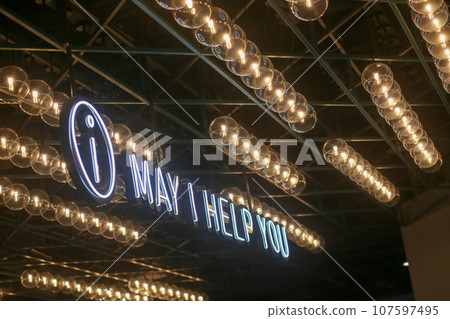 The ceiling is decorated with yellow circle light bulbs The ceiling is decorated with yellow circle light bulbs 107597495