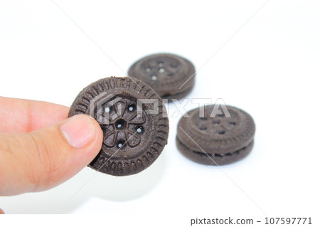 A picture of biscuits on white background with selective focus 107597771