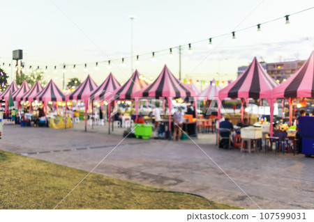 Blur image of flea market and food fair in Chiang mai city of Thailand. Blur image of flea market and food fair in Chiang mai city of Thailand. 107599031