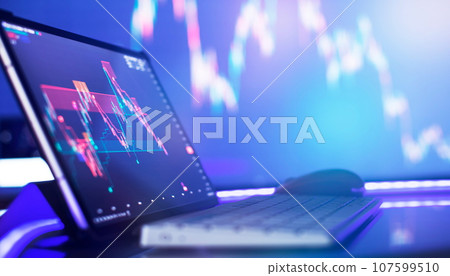 Working as an online trading broker from home. Internet work . Businessman analyzes 107599510