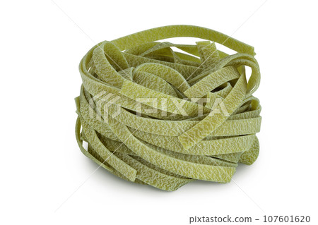 Raw tagliatelle green pasta with spinach isolated on white background 107601620