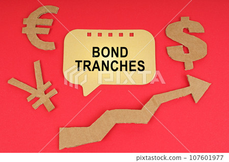 Business concept. On the red surface there are money symbols, an arrow and a sign with the inscription - Bond Tranches Business concept. On the red surface there are money symbols, an arrow and a sign with the inscription - Bond Tranches 107601977