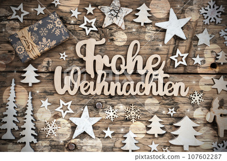 German Text Frohe Weihnachten, Means Merry Christmas In English, Flatlay German Text Frohe Weihnachten, Means Merry Christmas In English, Flatlay 107602287