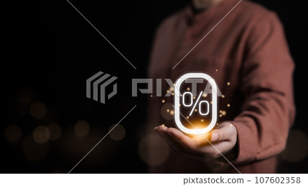 Woman holding glowing zero percentage or 0 percent for special offer of shopping department store and shop discount. Installment rate plan, Interest rate, Promotion marketing, Sale campaign, Advert, Woman holding glowing zero percentage or 0 percent for special offer of shopping department store and shop discount. Installment rate plan, Interest rate, Promotion marketing, Sale campaign, Advert, 107602358