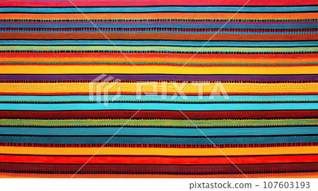 Colorful Mexican sombrero background. Close-up of colorful knitted texture. 107603193