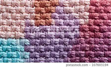 Colorful knitted pattern as background. Colorful knitted pattern as background. 107603194