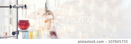 Banner Science chemistry glass tubes object on lab background. Wide Liquid tube biology laboratory chemical fluid scientist object medical glass tubes. Chemistry scientific background with Copy Space 107605735