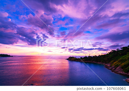 Nature view of Laem promthep cape Beautiful sunset or sunrise sky scenery in andaman sea, Amazing seascape in phuket thailand Beautiful nature background. Nature view of Laem promthep cape Beautiful sunset or sunrise sky scenery in andaman sea, Amazing seascape in phuket thailand Beautiful nature background. 107608061
