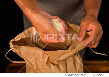 take out rice from bag take out rice from bag 107609510