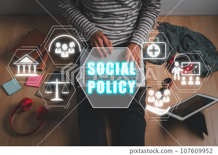 Social policy concept, Person using on laptop computer with social policy icon on virtual screen. Social policy concept, Person using on laptop computer with social policy icon on virtual screen. 107609952