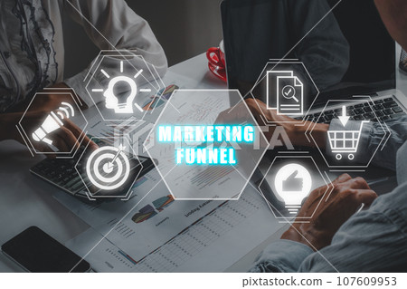 Marketing funnel concept, Business team analyzing income charts and graphs with marketing funnel icon on virtual screen. Marketing funnel concept, Business team analyzing income charts and graphs with marketing funnel icon on virtual screen. 107609953