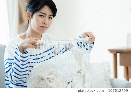 A woman who hates housework A woman who hates housework 107612799